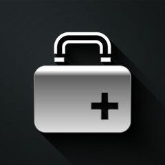 Silver First aid kit icon isolated on black background. Medical box with cross. Medical equipment for emergency. Healthcare concept. Long shadow style. Vector