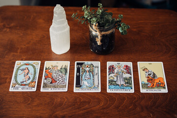 Naklejka na ściany i meble Tarot Cards Spread with Crystal and Jade Jar