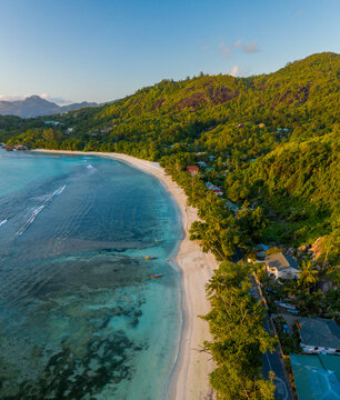 Aerial view of Baie Lazare beach along the coastline facing Lazare Bay, Takamaka, Seychelles.