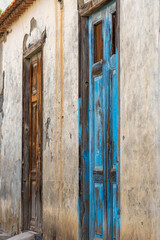 Wooden door, colorful, in vintage style, in a small village in the Valle Gran Rey on La Gomera. The valley of the great king, with its beauty and diversity, invites to hike and exploring of the enviro