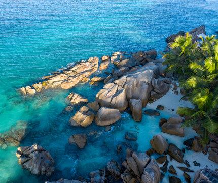 Aerial view of rocks along the coastline facing the Indian Ocean at Anse Severe, La Digue and Inner Islands, Seychelles.