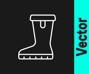 White line Waterproof rubber boot icon isolated on black background. Gumboots for rainy weather, fishing, gardening. Vector