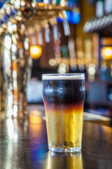 Whiskey, Hard Cider, and Stout Drink at a Bar