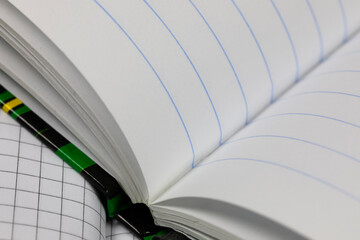 Fototapeta premium There are two school notebooks that are open