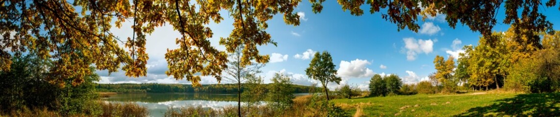 Panorama of autumn forest, beautiful and warm day, calm and windless.