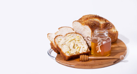 challah with butter and honey for breakfast