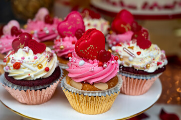 Colorful decorated cupcakes  for sale on candy shop to celebrate Happy Valentine's Day