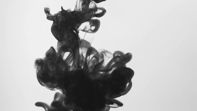Ink in the water. Abstract motion background