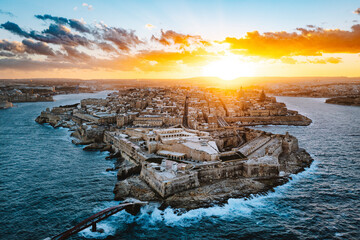 Aerial view of dramatic sunset and city panorama over the Valletta, Malta.