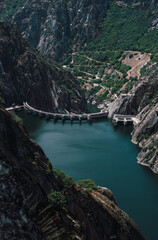 Landscape of dam between mountains in nature
