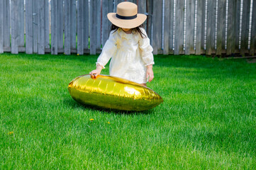 little girl enjoying nature in summer