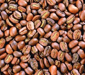 Cereal coffee in bulk on a black background.