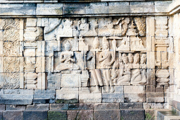 Obraz premium Close Up Photo of Detail of the Stone Bas Relief Carvings that Line the Walls of Borobudur Temple, Yogyakarta, Java, Indonesia, Asia