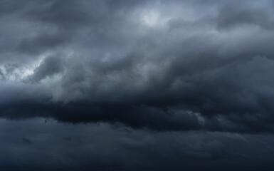 beautiful dark dramatic sky with stormy clouds before the rain or snow