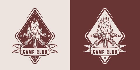 Obraz premium Camp campfire for camping. Burning bonfire with a large flame and sparks for explore and adventure in forest hiking