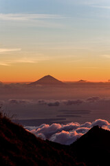 Sunset View over Mount Agung and Mount Batur on Bali, and the Three Gili Isles on the Three Day Mount Rinjani Trek, Lombok, Indonesia, Asia, background with copy space