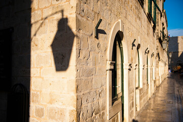 Fototapeta na wymiar Dubrovnik Old Town, shadow of a street lamp, Croatia