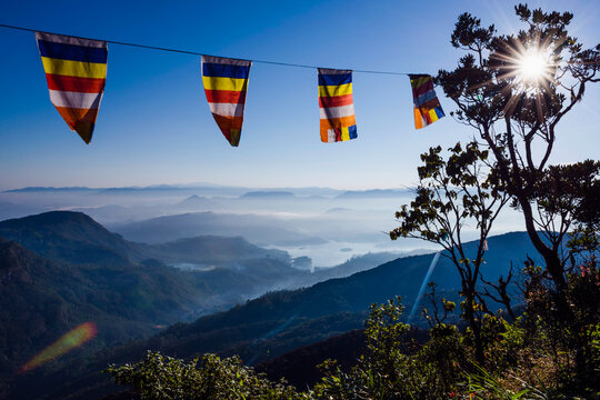 Adam's Peak (Sri Pada), misty mountain view with Buddhist flags, Central Highlands of Sri Lanka, Asia