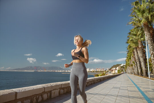 Caucasian female at daily fitness regime outdoors