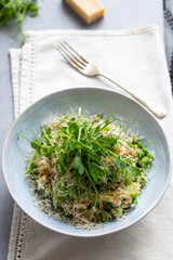 Risotto with broad beans, green pea and pea shoots