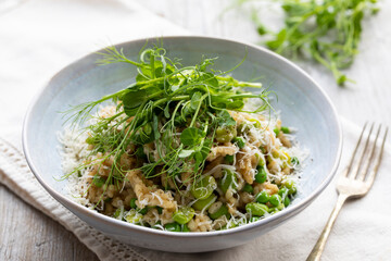 Risotto with broad beans, green pea and pea shoots