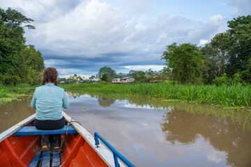Fototapeta na wymiar Canoe trip on the Gamboa river . At the community of Gamboa next to the amazon river, peru