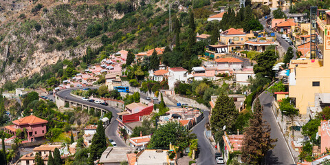 Taormina, panoramic photo of windy roads winding up through Taormina towards Castelmola, Sicily, Italy, Europe