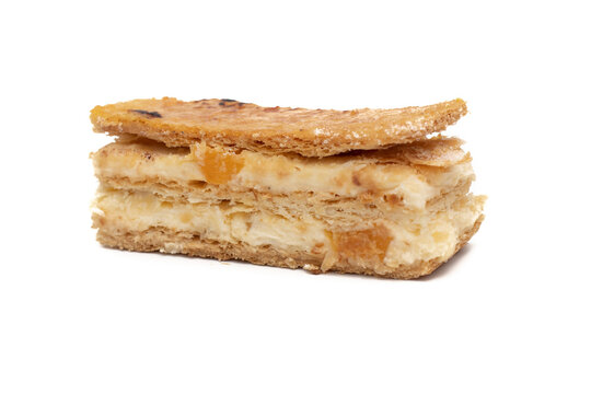 A delicious millefeuille piece of fruit. Isolated on white background.