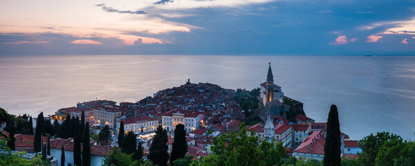 Panoramic photo of Piran, Slovenia at sunset, and the Mediterranean Sea, seen from Piran Town...