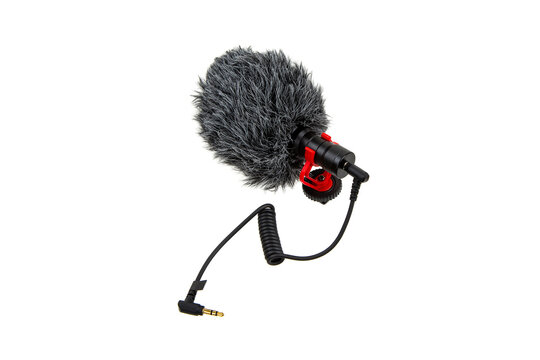 Small modern on-camera microphone with wind protection. Directional microphone. Audio recording tool. Isolate on a white back