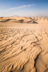 Sand dunes in the desert at Huacachina, Ica Region, Peru, South America