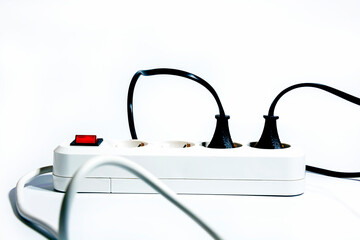 Extension cord with a button on a white background. Isolate. Copy space. Front view.