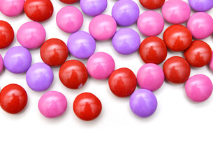 Closeup of colorful chocolate candies on white