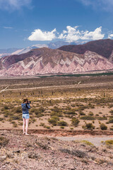 Fototapeta na wymiar Tourist at Cactus National Park (Parque Nacional Los Cardones), Cachi Valley, Calchaqui Valleys, Salta Province, North Argentina, South America