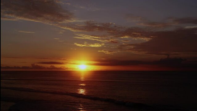 Sunset over the ocean. Timel apse