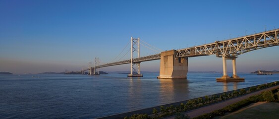 Fototapeta premium 夕日を浴びて輝く瀬戸大橋のパノラマ情景＠香川