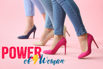 Legs of beautiful young women and text POWER OF WOMAN on color background. International Women's...
