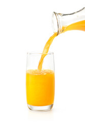 Pouring orange juice into the glass isolated on white background.