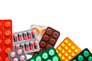 Different blister packs with pills on white background, closeup
