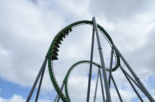 A Roller Coaster Ride In An Outdoor Park