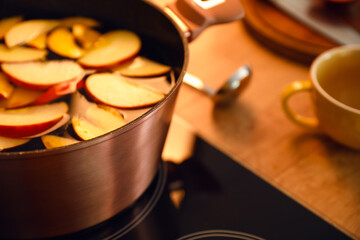 Cooking pot with delicious apple compote, closeup