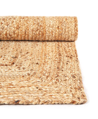 Trendy wicker carpet on white background, closeup