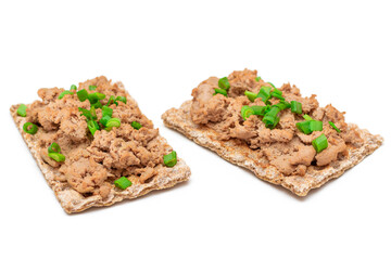 Crispy Sandwich with Chicken Pate and Green Onions Isolated on White Background - Top View. Whole Grain Bread with Liver Pate. Diet Breakfast and Healthy Food