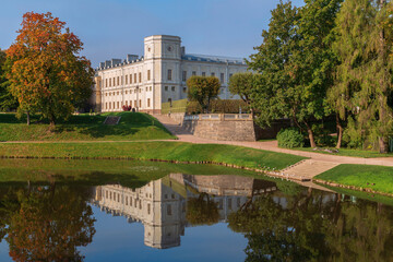 Palace and park ensemble of Gatchina Park: Karpin Pond, Gatchina Palace, private palace garden on a sunny autumn day, Gatchina, St. Petersburg, Russia