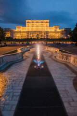 Fototapeta na wymiar Palace of the Parliament at night, Bucharest, Muntenia Region, Romania
