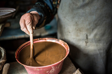 Woman making Horezu ceramics, a unique type of Romanian pottery, UNESCO Cultural Heritage List, Wallachia, Romania