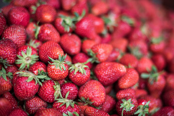 Strawberries for sale in Sapanta Market, Maramures, Romania, background with copy space