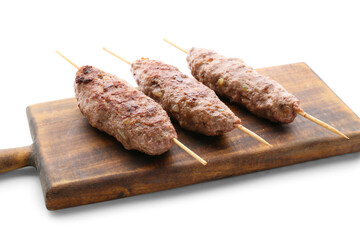 Wooden board of skewers with tasty lula kebab isolated on white background