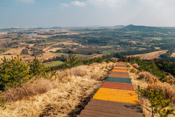 Yeongju Mountain Oreum volcanic cone hiking trail road at winter in Jeju Island, Korea