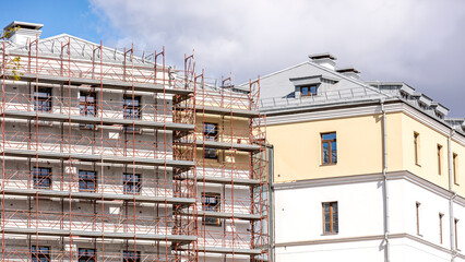 building with scaffolding. preparation before the reconstruction of commercial buildings.